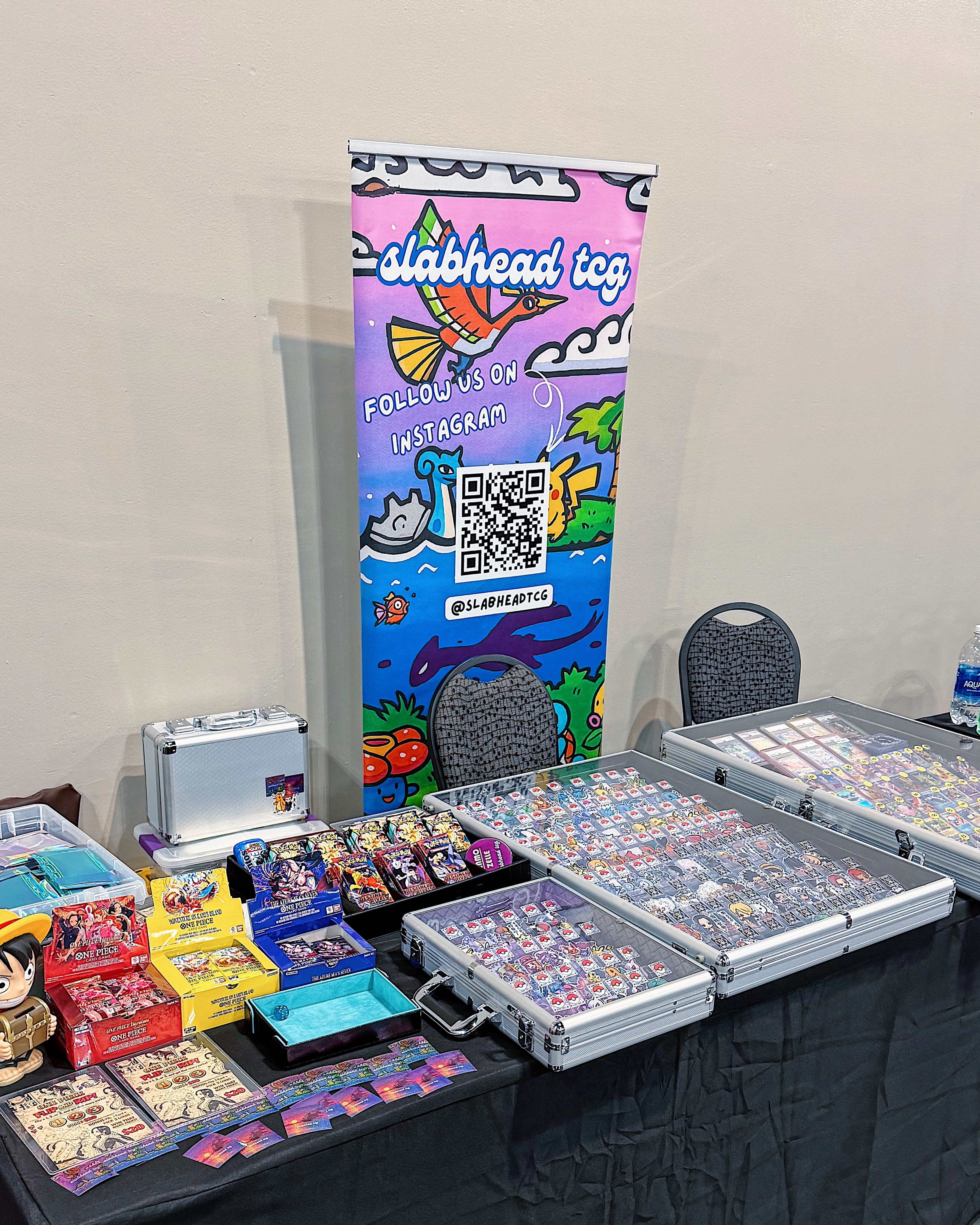 Case of Pokemon and One Piece stickers